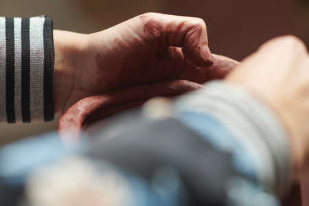 A closeup shot of hands sculpting a clay vaseの写真素材