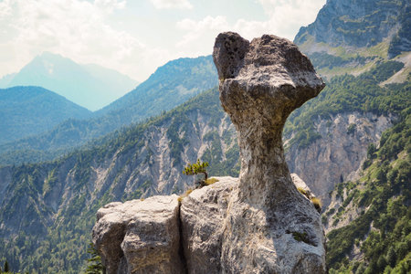 Steinerne Agnes rock formation at Berchtesgaden alps, with mountains and forest, Bavaria, Germanyの写真素材