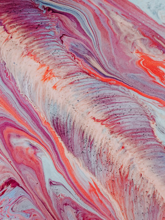 A vertical shot of an abstract painting with mixed colorful oily colors - perfect for wallpaperの写真素材