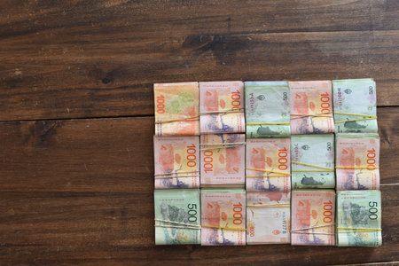 flatlay of argentine peso 500 and 1000 peso banknotes, symbol of inflationの写真素材