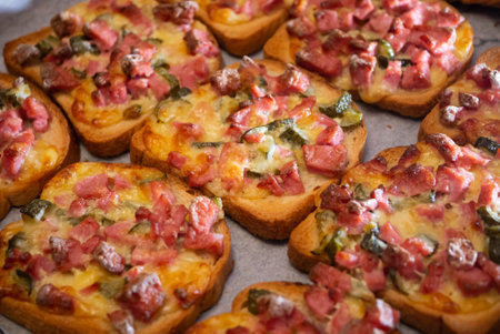 A high-angle shot of pizza on toast breadの写真素材