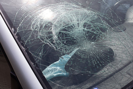 A closeup shot of a broken windshield