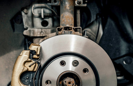 A closeup shot of the gears of a mechanismの写真素材