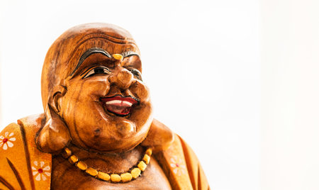 A closeup shot of the laughing buddha statueの写真素材