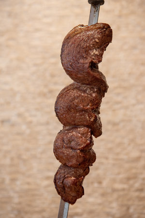 picanha roasted on the grill in a steakhouseの写真素材