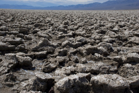 Barren landscape at Devil's Golf Course at Death Valley National Monument, Californiaの写真素材