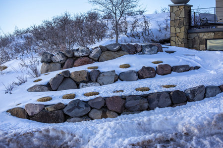 Stone stairs covered with snowの写真素材
