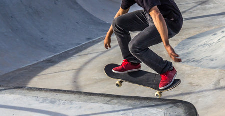 A closeup shot of a person skating in a skateparkの写真素材