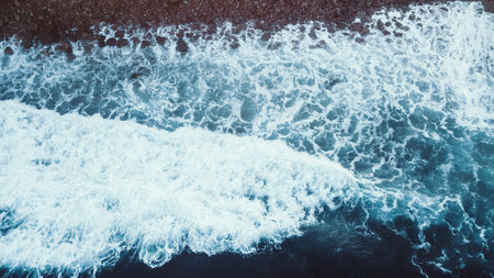 StunAerial View of Waves and Beaches at Sunset Along the Great Ocean Road, Australiaの写真素材