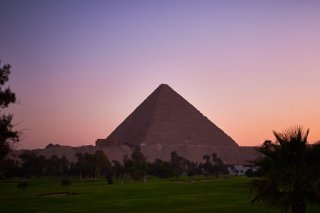 The beautiful scenery of Giza Necropolis in Egypt with beautiful sunset backgrounの写真素材