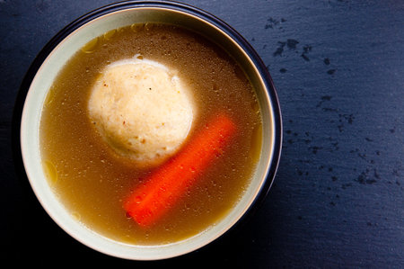 home made matzoh ball soup with carrots and chickenの写真素材