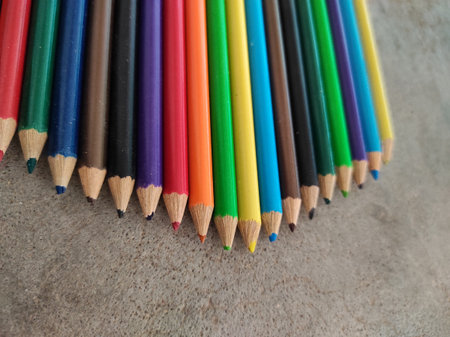 A set of colored pencils on a concrete surfaceの写真素材