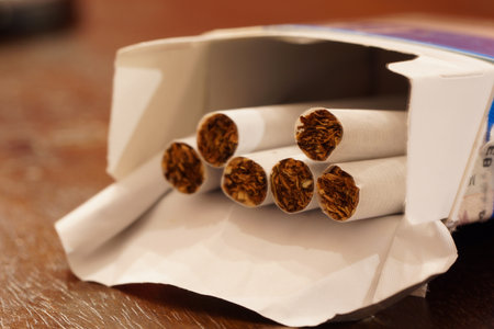 A closeup shot of an open pack of cigarettesの写真素材