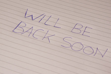 A small note with the text "will be back soon"の写真素材