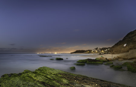 A mesmerizing view of a beautiful seascape at scenic sunsetの写真素材