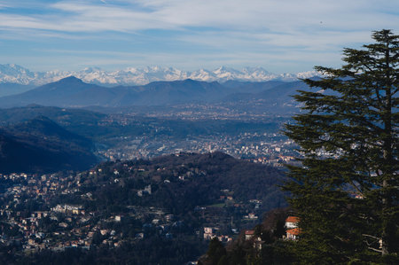 A beautiful shot of Como city with the Alps in the backgroundの写真素材