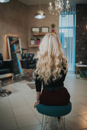 A vertical shot of a blonde female with new hairstyleの写真素材