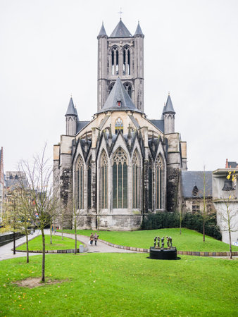 A vertical shot of the Saint Nicholas' Church in Ghent, Belgiumの写真素材