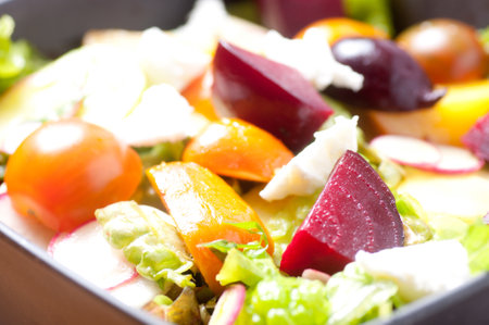 A closeup shot of a mixed salad in a bowlの写真素材