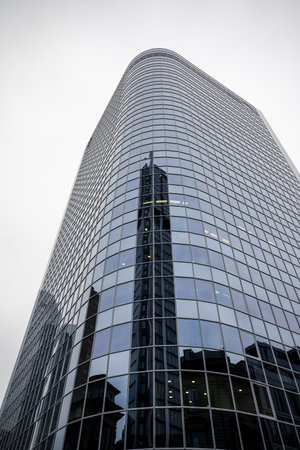 A low angle shot of a scenic skyscraper in theÂ financial hub of Frankfurt named Frankfurt am Main