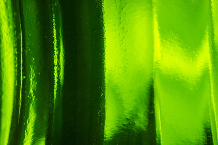 A beautiful shot of lovely stained glass with light reflecting on it and decorated designの写真素材