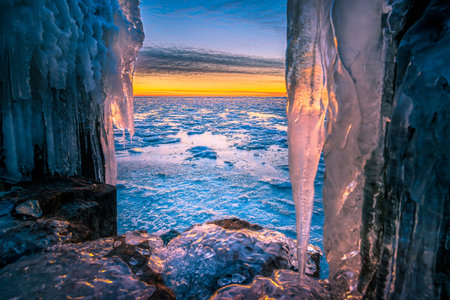 The frozen water as ice, created by wind and waves at the dutch shore throughout the winter