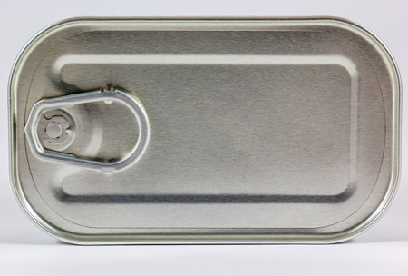 A closeup shot of a metal can on the white background