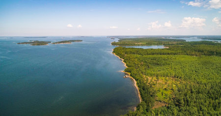 Aerial drone view hig, overlooking the rocky coast of Hogsara island, on the Gulf of Finland, sunny, summer day, in Varsinais-suomi,の素材 [FY310204406474]