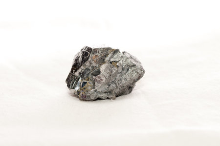 skutterudite metal ore mineral sample stock photo on a white background