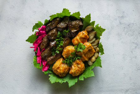 A closeup shot of asian-style cabbage wraps on a white surfaceの写真素材