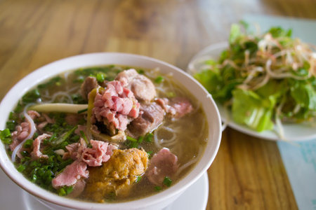 A shot of Vietnamese soup in a bowlの写真素材