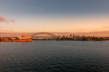 A beautiful view of the Sydney Harbor Bridge in Australia with the Royal Botanic Gardens visibleの写真素材