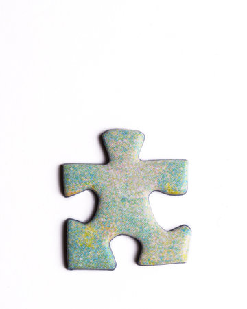 Puzzle piece in the shape of person walking isolated on white background.の写真素材