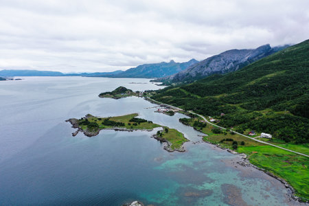 Aerial drone view overlooking a polar town in the Vesteralen archipelago, Norway - grey, overcast dayの写真素材