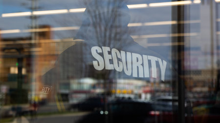 A closeup shot of  guard inside a commercial building with reflecting light of the windowの写真素材