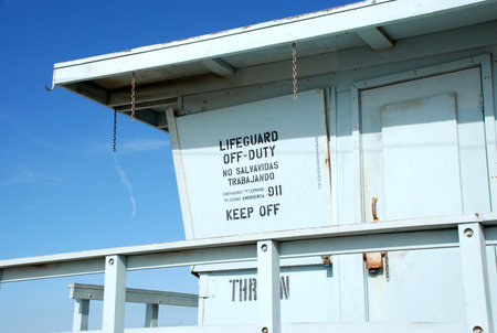 Unmanned Baywatch Lifeguard hut on empty beach of Los Angeles, Californiaの写真素材