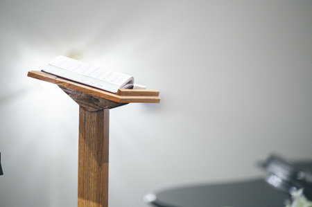 An open notebook on a tribune for speech on a stageの写真素材