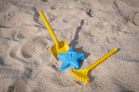 A closeup shot of toys for playing with sandの写真素材