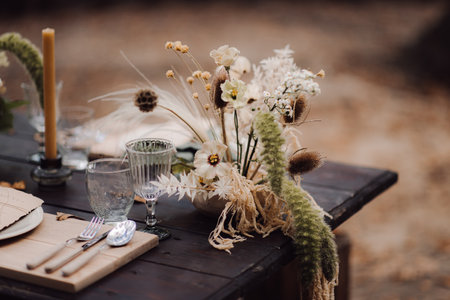 A beautifully designed wedding table in the forestの写真素材