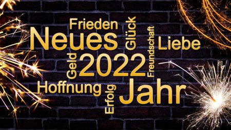 A 2022 greeting card wishinluck, peace, love, friendship, money, hope, and success in Germanの写真素材