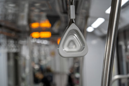 A closeup shot of triangular handles on a trainの写真素材