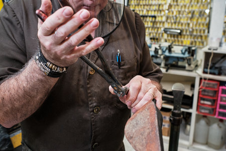A shoemaker working in a workshop