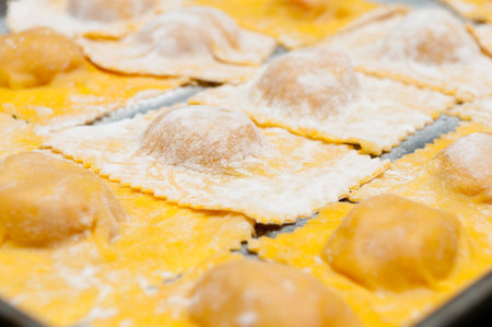 A closeup shot of raw dumplings on the tableの写真素材