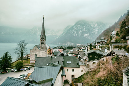 A beautiful view Hallstatt with misty mountains in the backgroundの写真素材