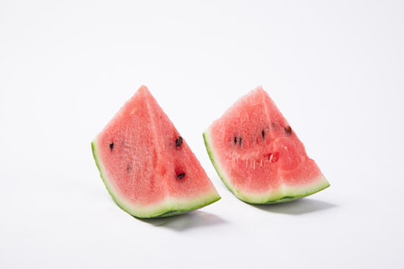 A closeup shot of fresh watermelon isolated on white backgroundの写真素材
