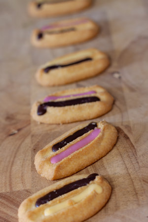 A vertical shot of homemade cookies with different creams