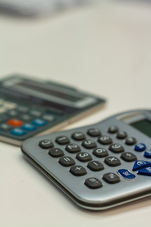 A vertical closeup shot of a calculatorの写真素材
