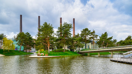 A beautiful view of a green Autostadt park in Wolfsburg, Germany on a sunny dayの写真素材