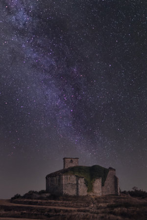 A beautiful shot of the Milky Way galaxy over the ruined church in Spainの写真素材