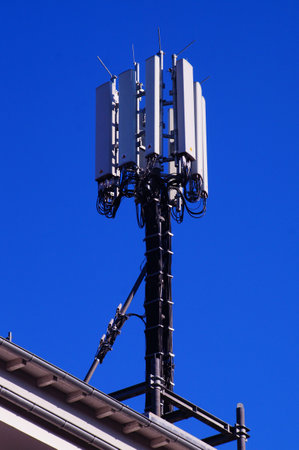 Cell phone masts on a house roof in Frankfurt, Germany.